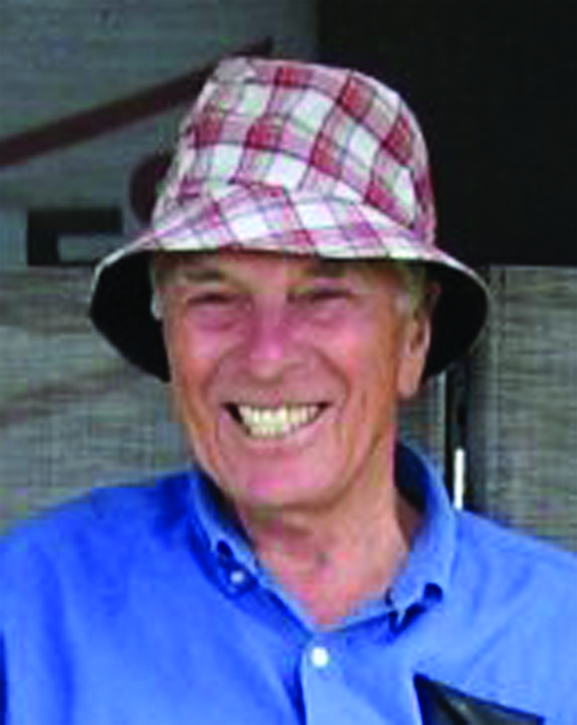 Man with plaid bucket hat photo